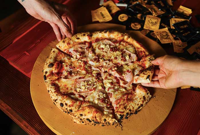 FoodPartners adquiere pizzería Mangia como parte de su estrategia de expansión